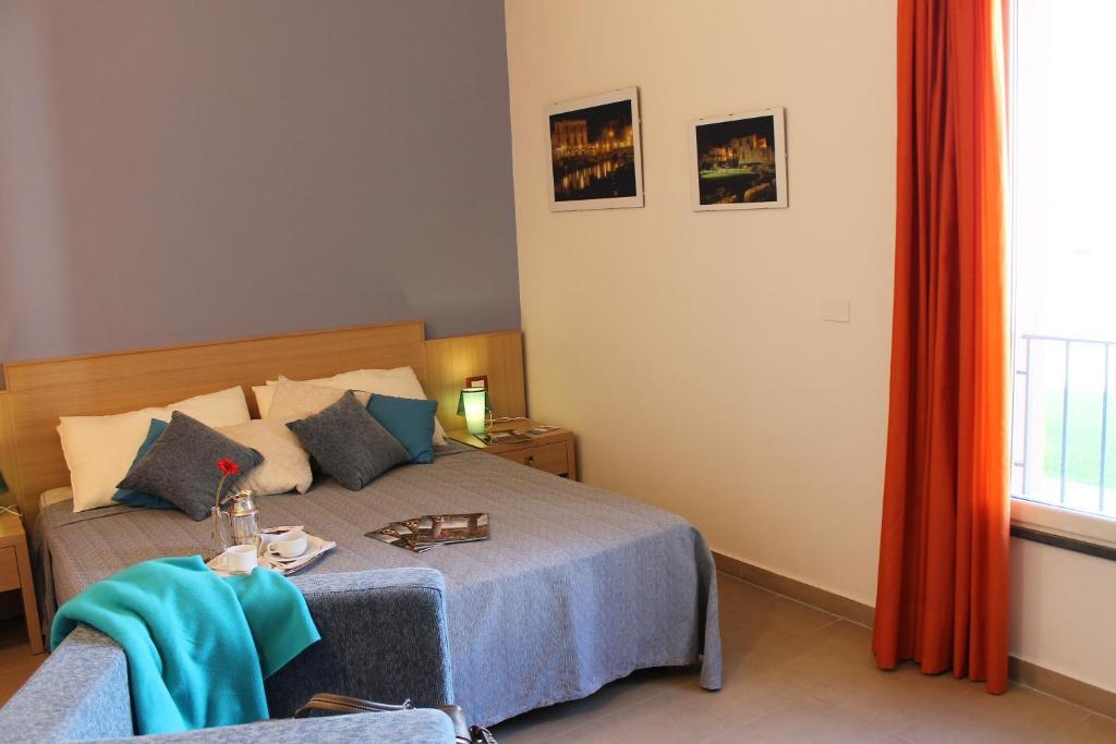 Le Residenze Archimede Aparthotel Сиракуза Екстериор снимка